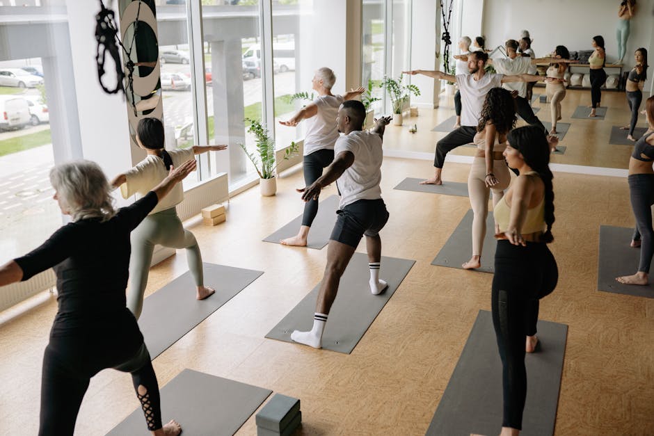Diverse group of people practicing yoga together