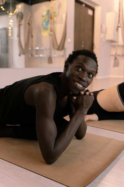 Experienced yoga instructor smiling