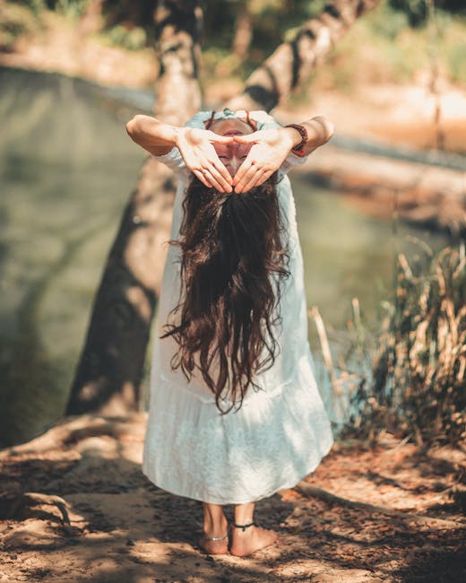 Person meditating peacefully in a serene environment