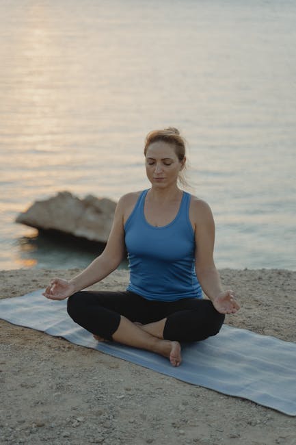 Woman doing a yoga pose outdoors